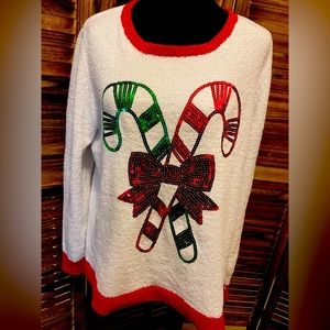 Adorable holiday sweater. Super cute, only worn once.  Sequins are in tack.🎄
